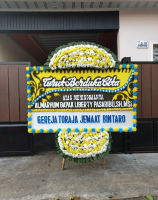 Papan Bunga Duka di Kutawaluya